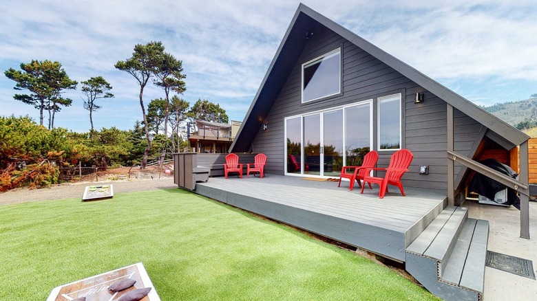 A-frame home with lawn