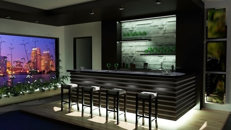 Slightly lighted bar with stools