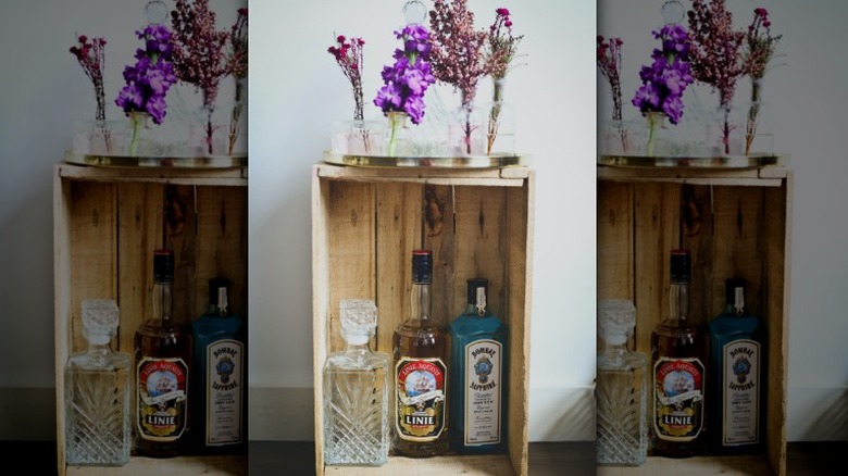 Flowers on a repurposed crate of gin