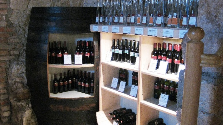 Bottles stored in barrel and rack