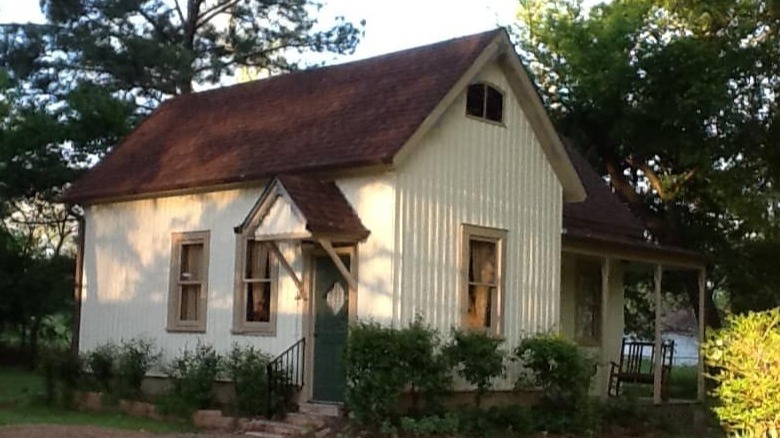 Cottage with brown roof