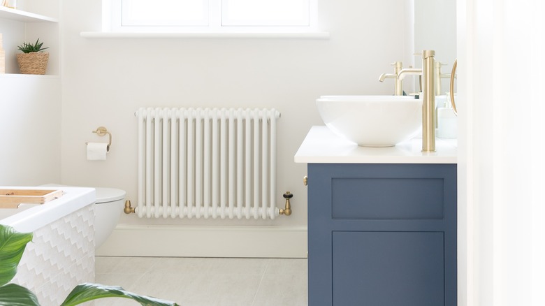 Bathroom with gold fixtures