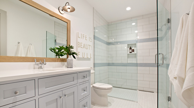 Bright bathroom with glass shower door