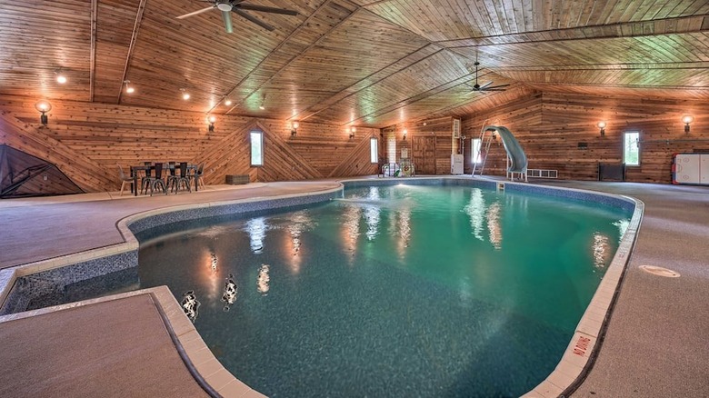 Indoor pool under wood ceiling