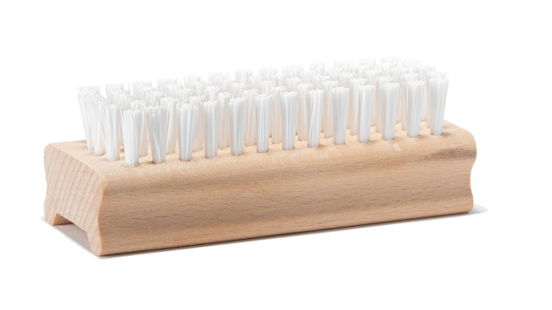 Closeup wooden upholstery brush