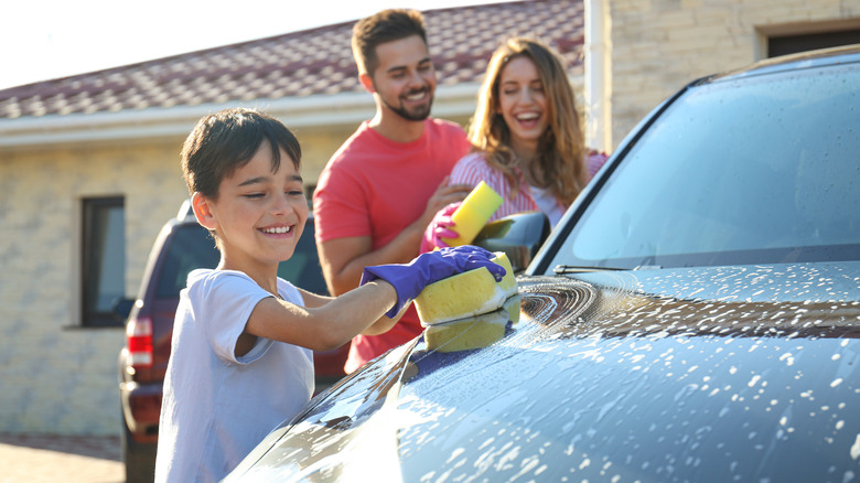 Family washing car