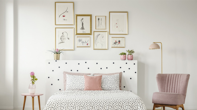 wall with framed illustrations