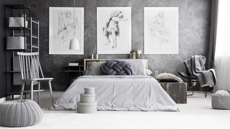 bedroom with sketches on the wall