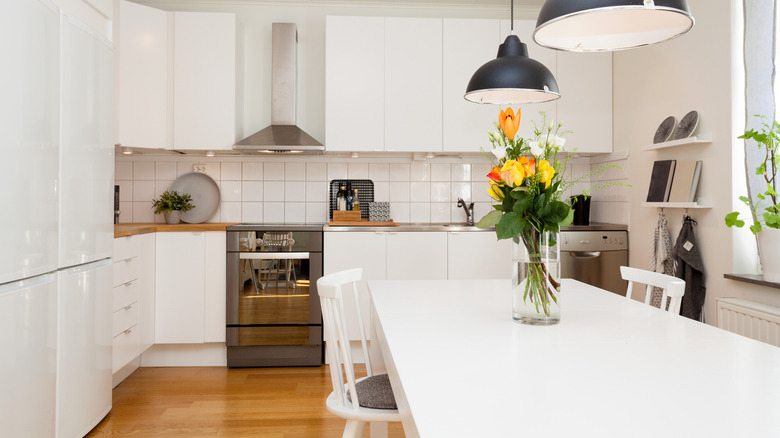 white kitchen with flowers