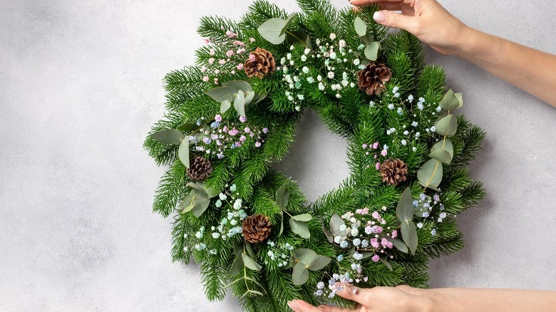 Wreath with pinecones and flowers