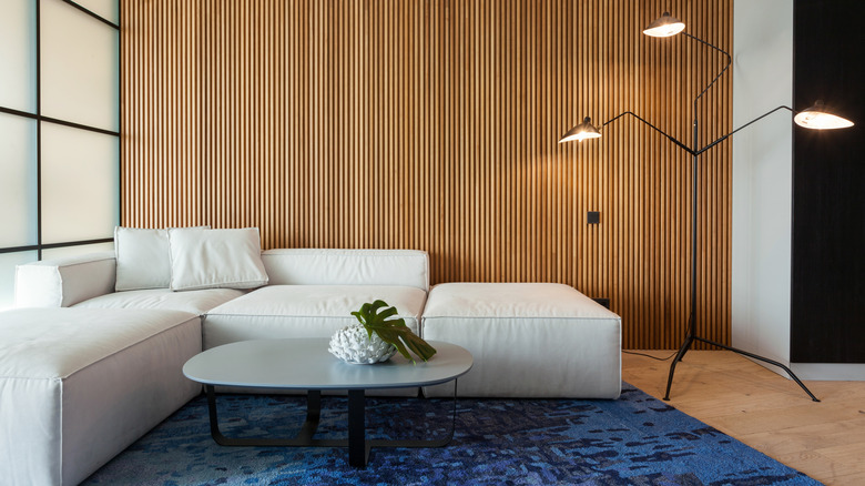 living room with wood wall