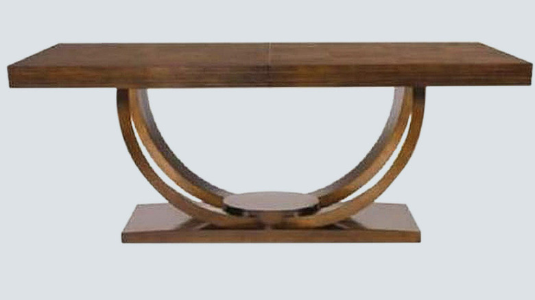 Coffee table with crescent shaped legs