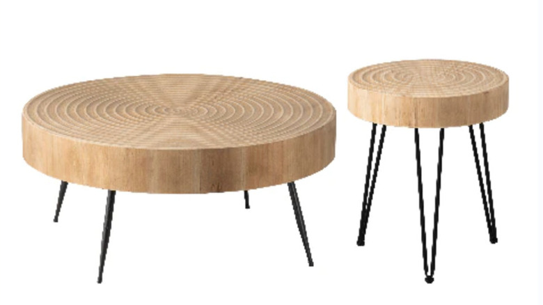 two round wooden coffee tables of different sizes