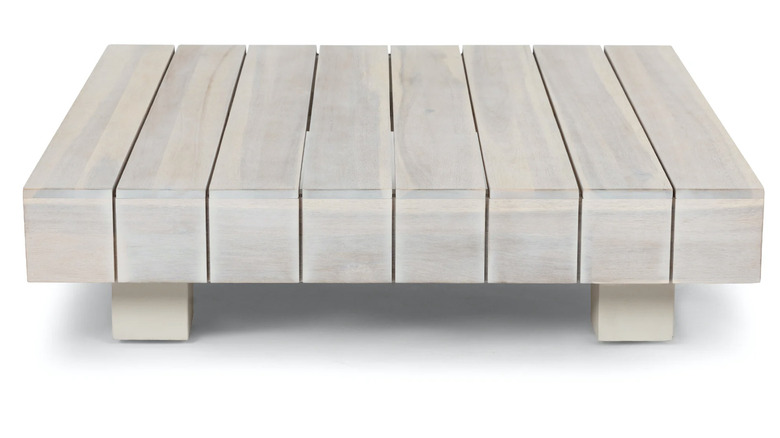 thick, gray wood slab coffee table