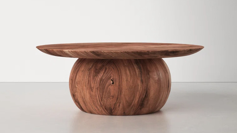 Coffee table with spherical stand