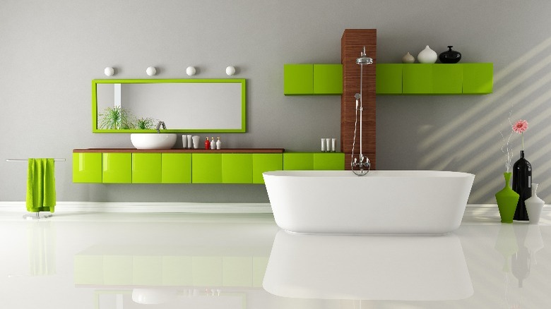 Bathroom with green cupboards