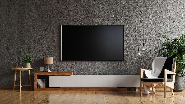 Wall-mounted television in room