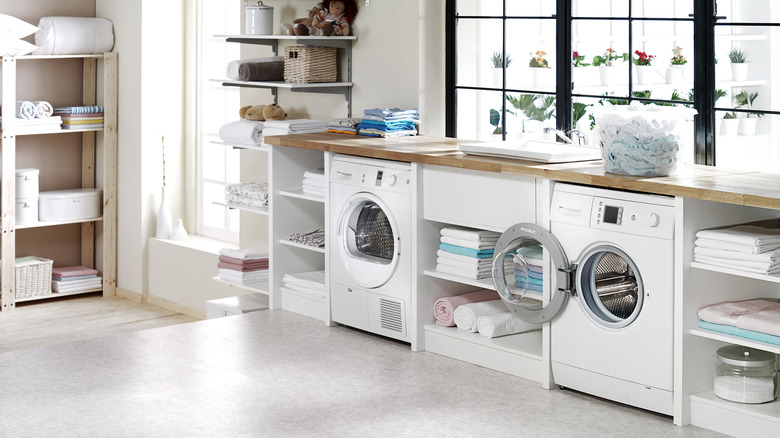 laundry room with cabinets