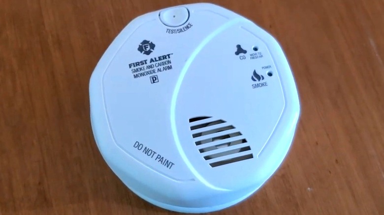 First Alert smoke detector on wooden surface