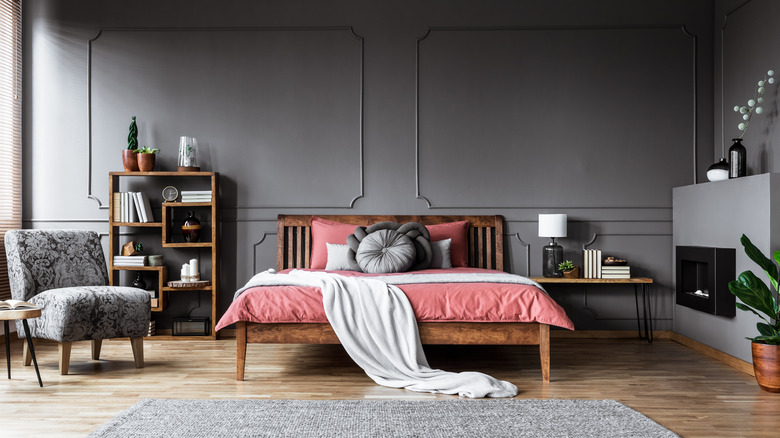 A bedroom with gray walls