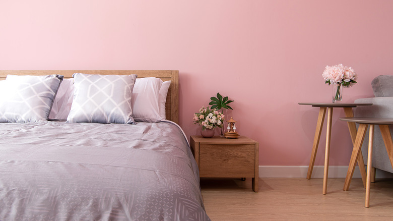 Bedroom with light pink wall