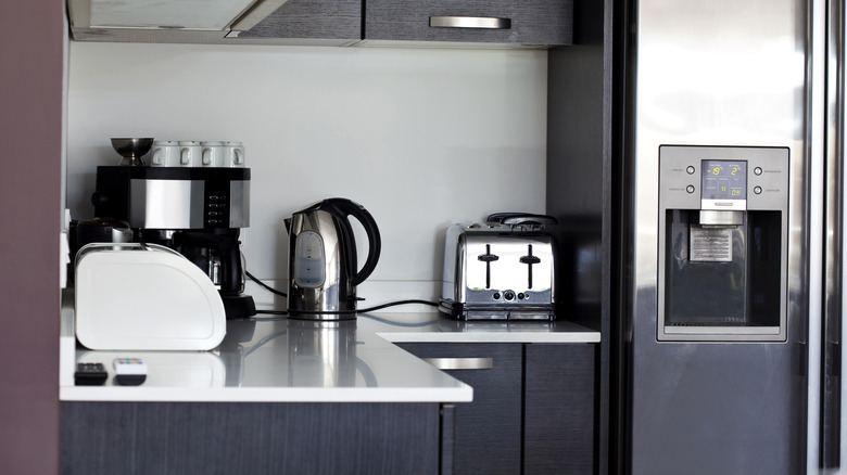 Small appliances on counter in kitchen