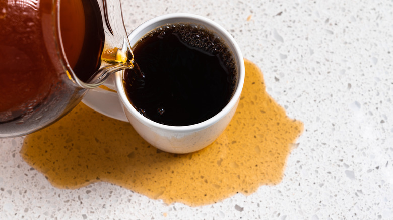 Spilt coffee on kitchen counter