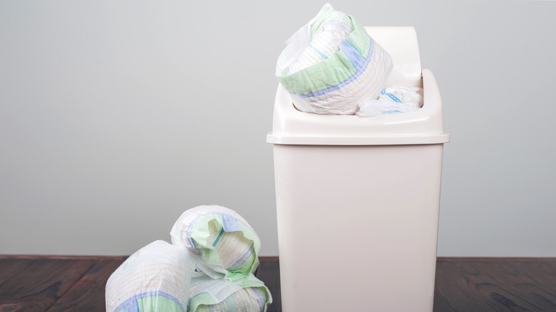 diapers in trash can 