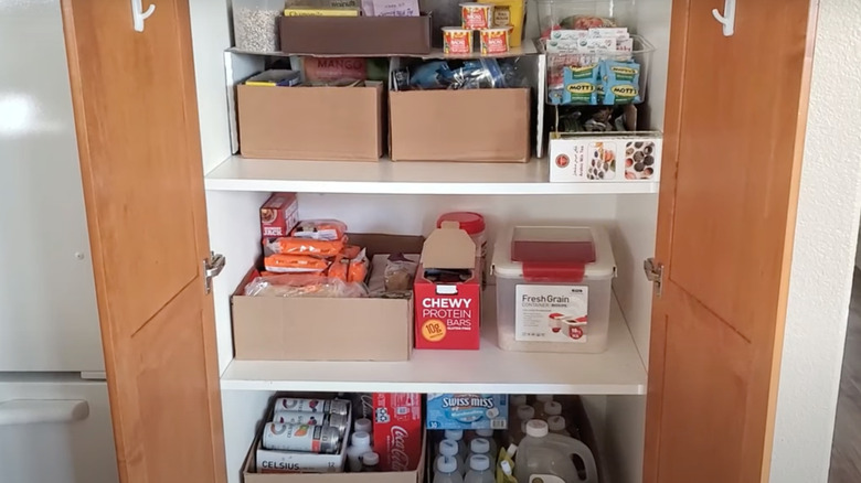 DIY snack storage for pantry made from old soda boxes