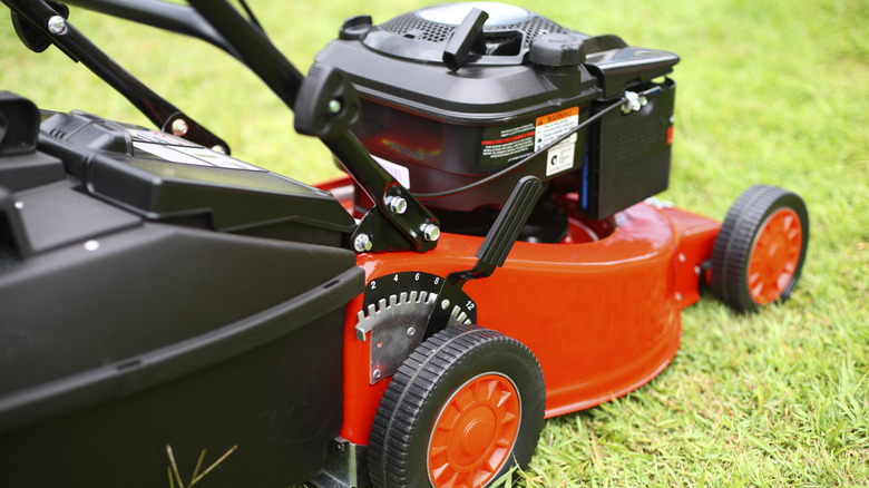 Red and black lawnmower