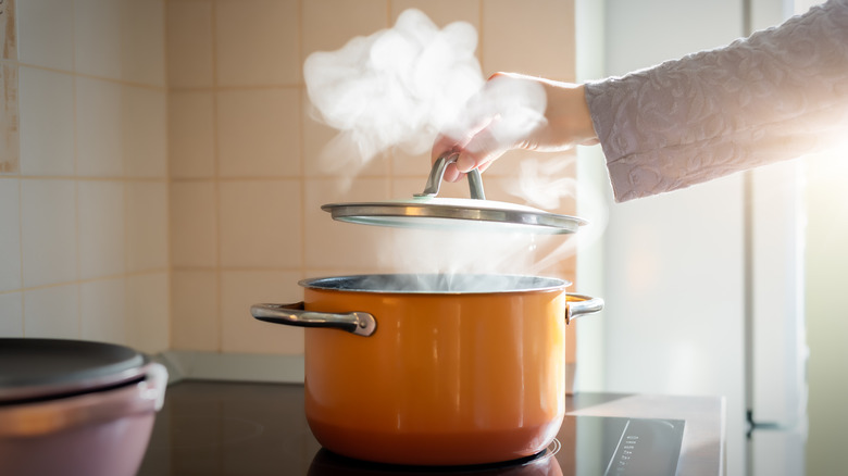 Orange pot of boiling water