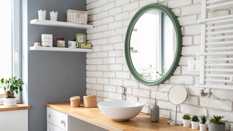 White brick wall in bathroom