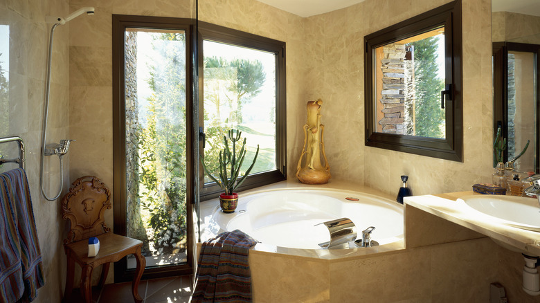 Beige Tuscan style bathroom