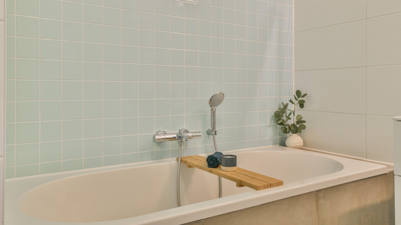 Light blue bathtub wall