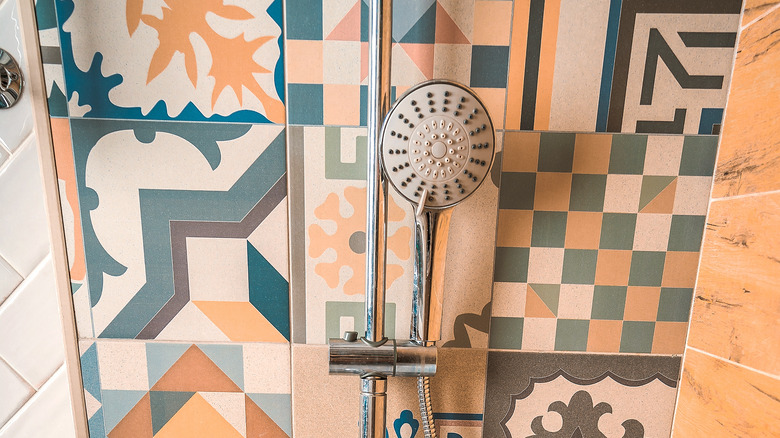 Mismatched mosaic shower wall
