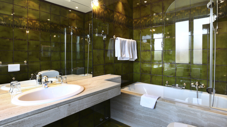 Olive green bathroom wall tiles