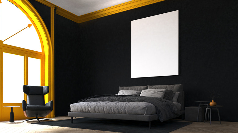 black bedroom with gold trim