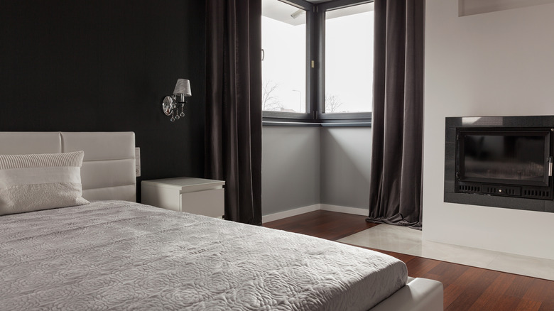 bedroom with black wall