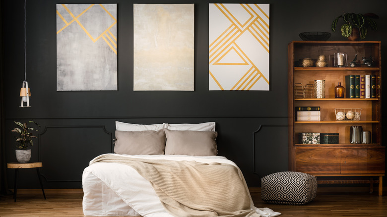 black bedroom with wood shelving