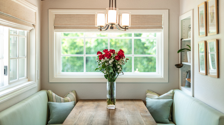 teal cushions on built-in benches