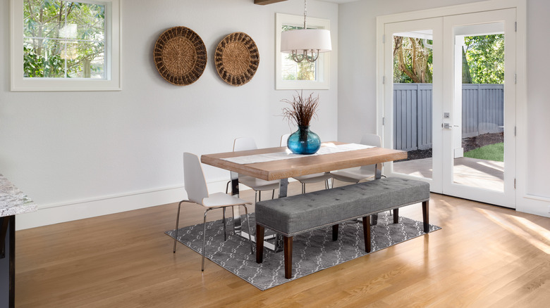 gray upholstered dining room bench