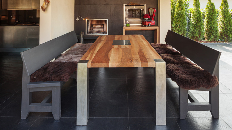 long black benches with cushions