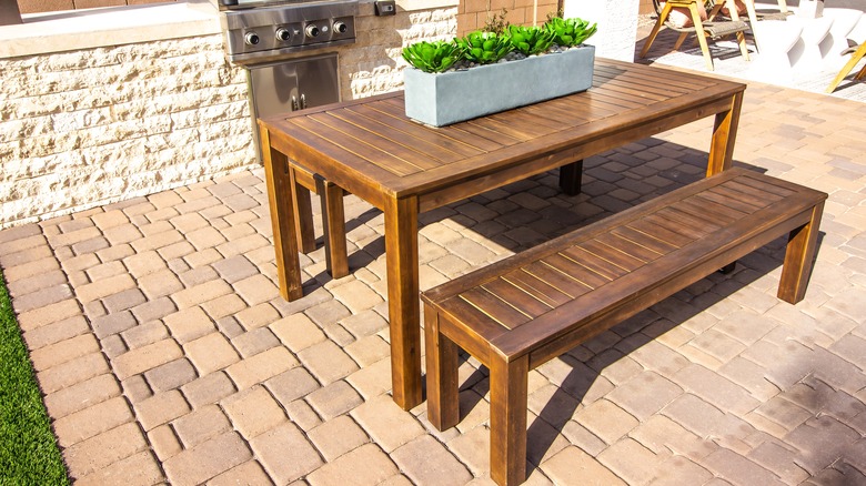 wooden table and benches outside