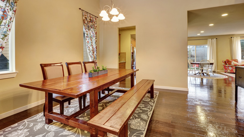 traditional dining room with bench