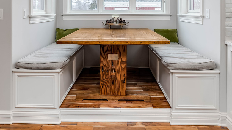 storage benches around wooden table