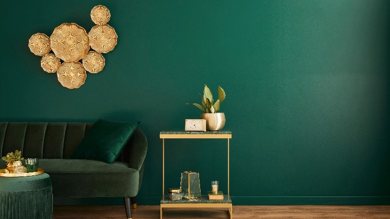 Green room with gold accents