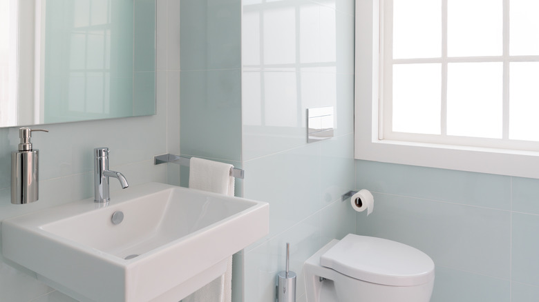 bathroom with glossy tiles