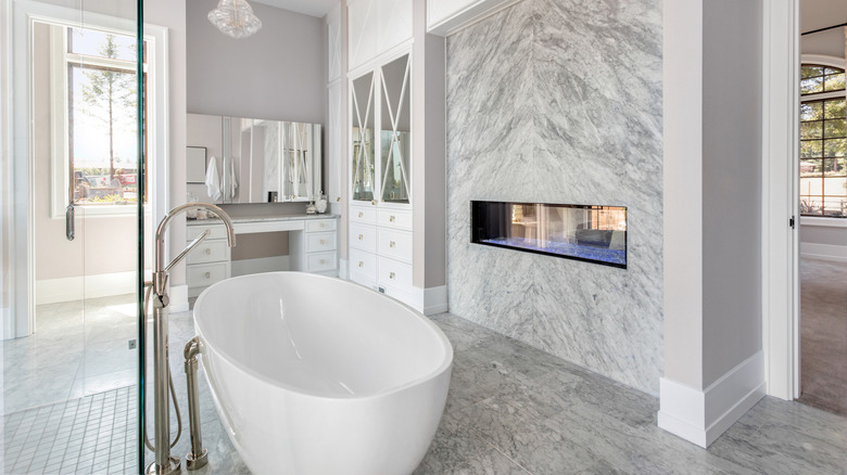 bathroom with modern fireplace