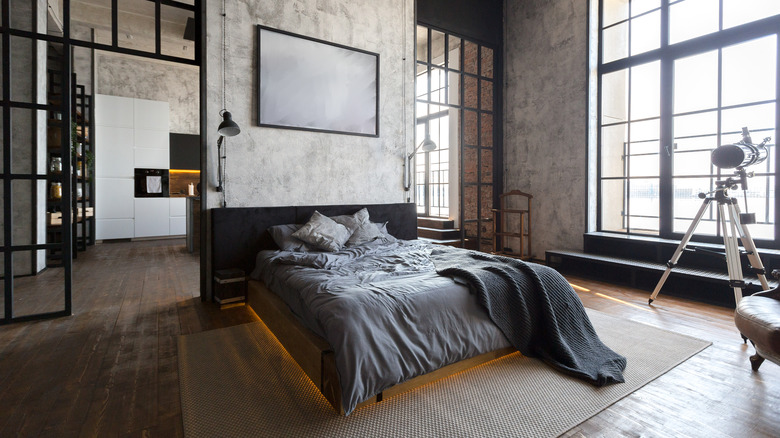 bedroom with cement walls