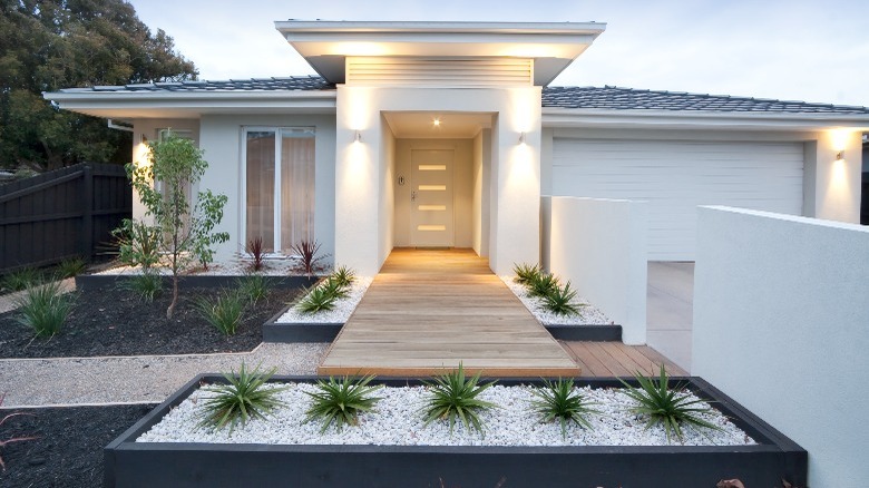 White home with simple landscaping